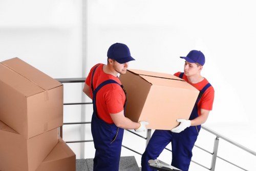 Staff and customers following safety procedures at a storage facility