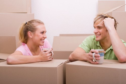 House removals planning in Carshalton with moving boxes and a removal van