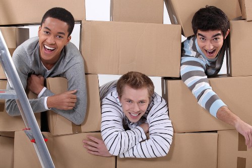 Packing boxes for a flat move in Carshalton