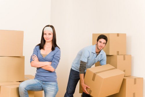 Packed boxes and textbooks in student storage in Carshalton