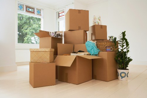 Professional movers handling furniture during Carshalton removals