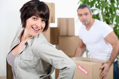 Loading furniture into a van during a Carshalton relocation